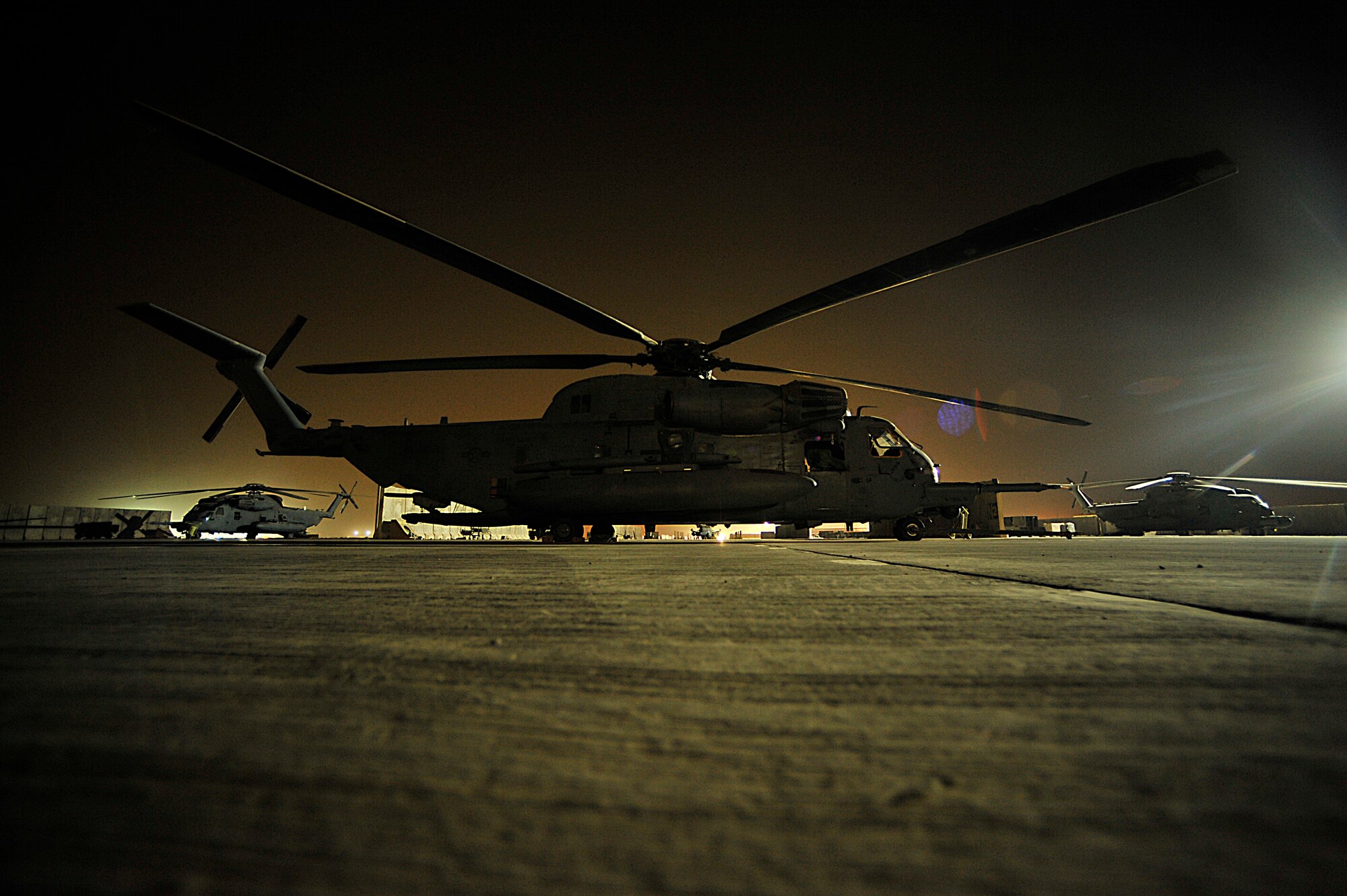 U.S. Air Force MH-53 Pave Low's from the 20th Expeditionary Special Operations Squadron sit on the tarmac in Iraq prior to the last combat mission of the Pave Low on Sept. 27. The MH-53 Pave Low retiring after nearly 40 years of service to the United States Air Force.
(Photo by Staff Sgt. Aaron Allmon)  
