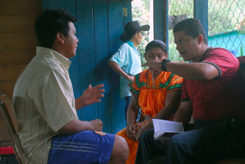 ALTO DE CARONA, Costa Rica - Kanaki Carrera (left), a village leader in Alto De Carona, discusses with Dr. Wilmer Amador the challenges his neighbors face living in one of the most remote areas of Costa Rica, Sept. 27. Mr. Carrera called the joint mission carried out by JTF-Bravo and Costa Rica officials "a dream come true." Dr. Amador is a liaison officer for Joint Task Force-Bravo's Medical Element. (U.S. Air Force photo by Staff Sgt. Joel Mease)