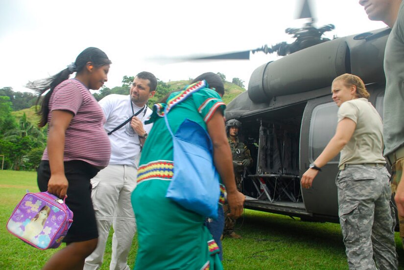 ALTO DE CARONA, Costa Rica - Two pregnant women were flown out of the village by Joint Task , so they could receive specialized medical care Sept. 27. The medical care access provided by the joint effort by JTF-Bravo and Costa Rica officials gave a once-in-a-lifetime opportunity for these women. (U.S. Air Force photo by Staff Sgt. Joel Mease)