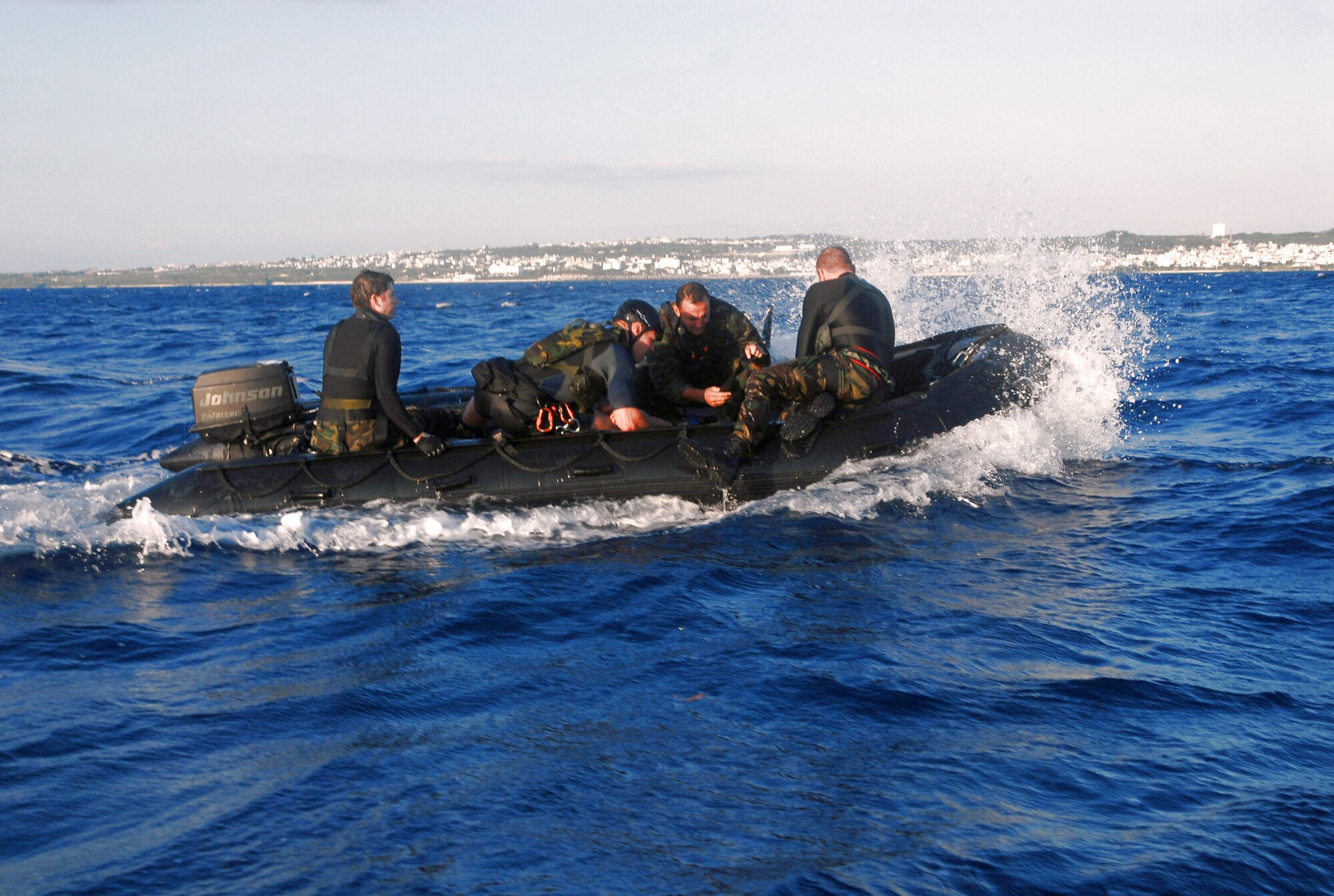 Pararescuemen of the 31st Rescue Squadron return to shore after performing water rescue training using an inflatable zodiac boat in 2007 off of Kadena Air Base, Japan. (U.S. Air Force photo/Staff Sgt. Christopher Marasky) 