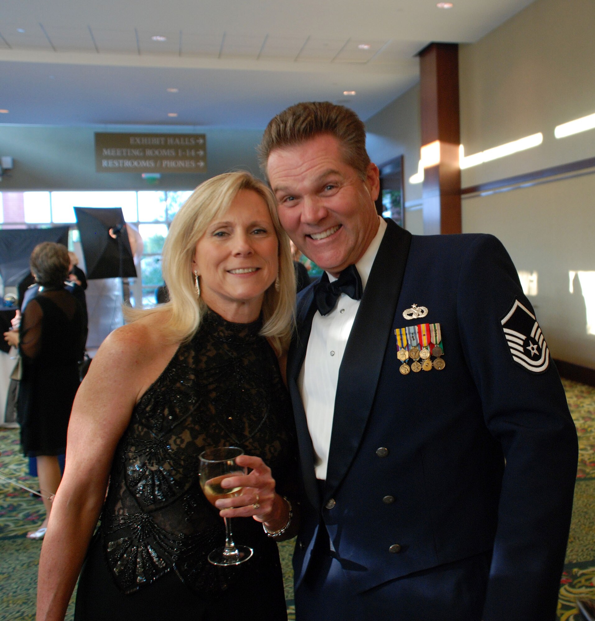 Master Sgt. (Ret) Tom Crawford and Janice Newton pose for a picture at the 2008 Air Force Ball.  The Air Force Ball was postponed for three weeks due to evacuations forced by Hurricane Hannah. (U.S. Air Force photo/Mr. Robert Baldwin) 