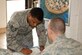 LANGLEY AIR FORCE BASE Va. -- Staff Sgt. Torray Riles, 1st Medical Support Squadron, registers to vote at the base exchange Sept. 30. "Every vote counts and the only way to be heard is through voting," said Sergeant Riles. ( U.S. Air Force photo/Airman 1st Class Jonathan Koob)

