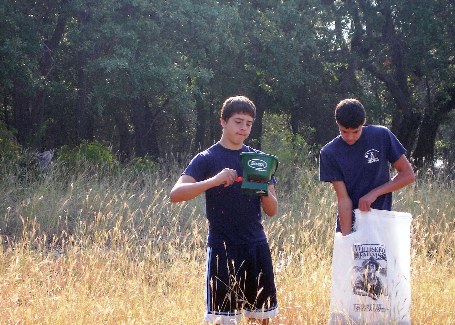 Justin Ulrich (left), 16, and Ricky Trevi?o, 17, were among 12 Randolph Boy Scouts who planted wildflower seeds at Canyon Lake Recreation Area on Sept. 27 in support of National Public Lands Day. Each year, Randolph Air Force Base applies for ?Legacy Funding? to complete a service project and, this year, was awarded $5,450 to fund the planting. (Courtesy photo) 