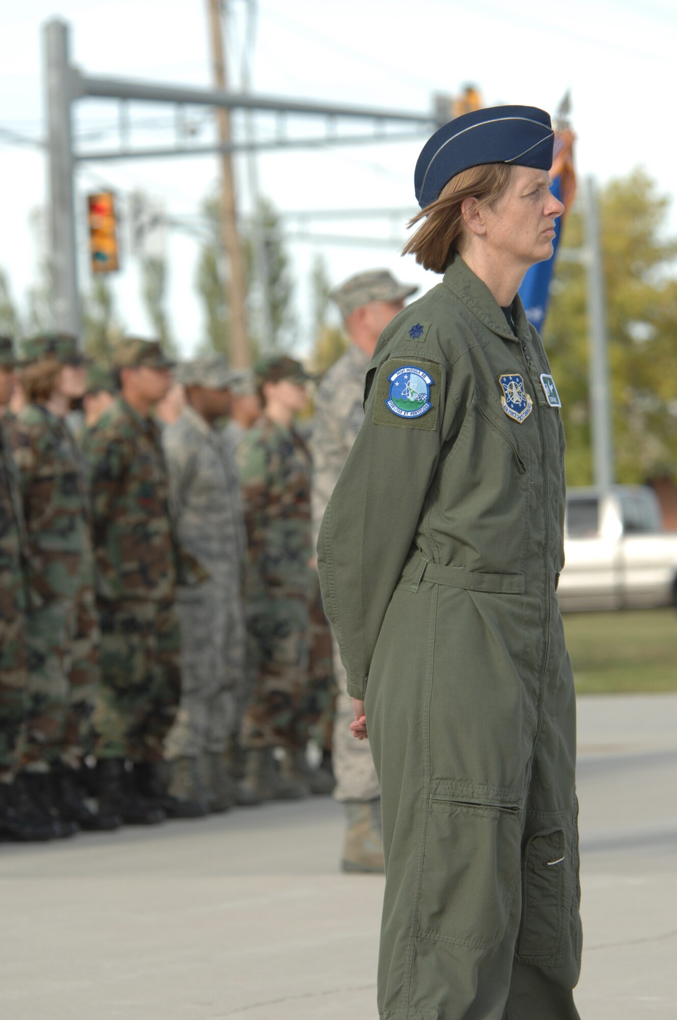 MINOT AIR FORCE BASE, N.D. -- Lt. Col. Debra Rose, 741st Missile Squadron commander, waits for the next command during a POW/MIA Recognition Day retreat ceremony here Sept. 25.  The ceremony was organized as a joint effort between the 5th Bomb Wing and 91st Missile Wing as a way to pay tribute to all prisoners of war and missing in action service-members, who have served, suffered and given their lives for our nation. (U.S. Air Force photo by Staff Sgt. Keith Ballard) 
