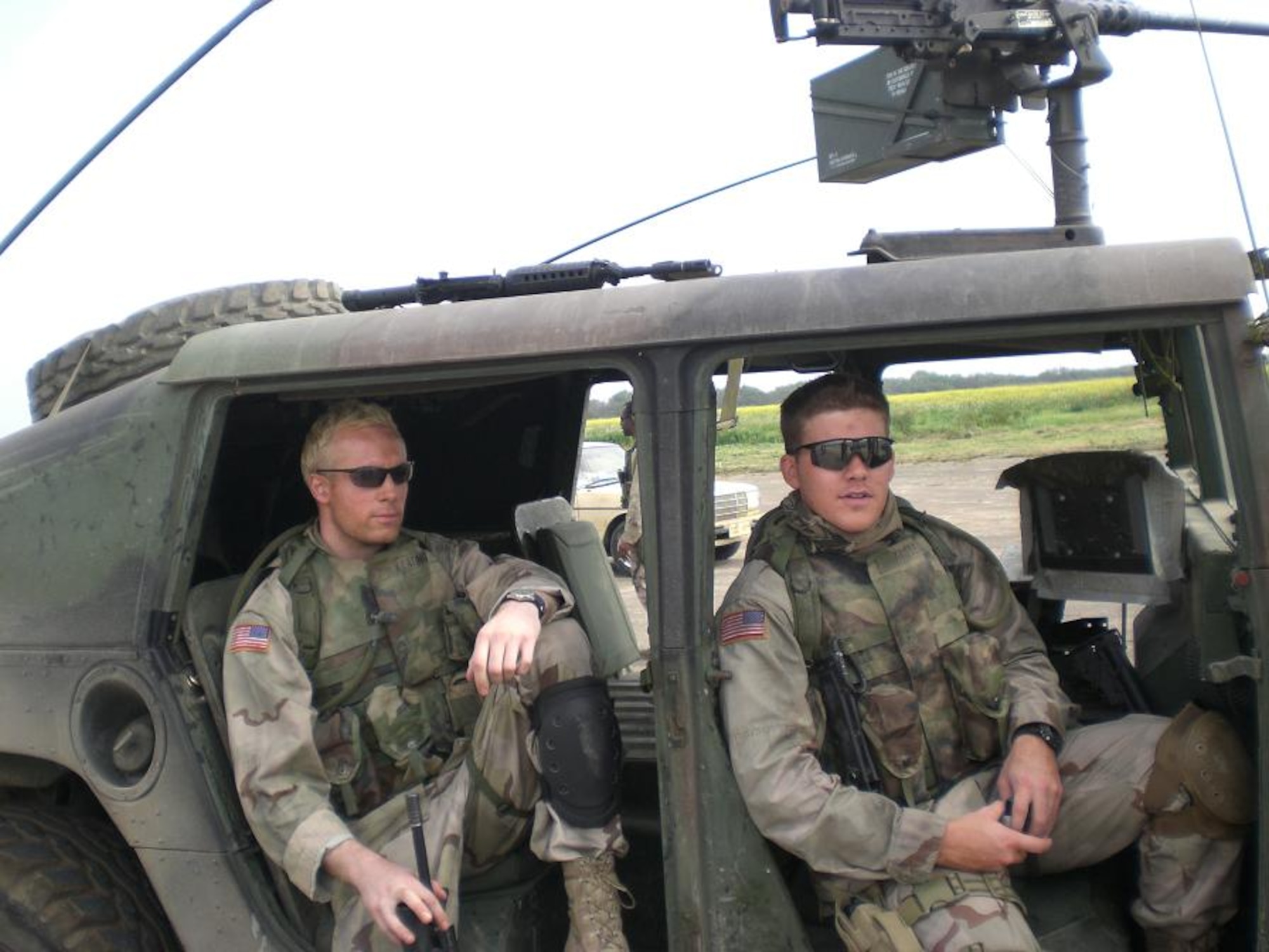 JAC Sgt. First Class Christopher C. Slaughter (right) with friend and fellow body double Johnny Harrison on the set of the upcoming film Green Zone starring Matt Damon. The JAC NCO served as body double for Damon (Chief Warrant Officer Roy Miller in the film)  while Harrison, a fashion designer in real life, doubled for another key actor.   (Photo courtesy of Christopher Slaughter)