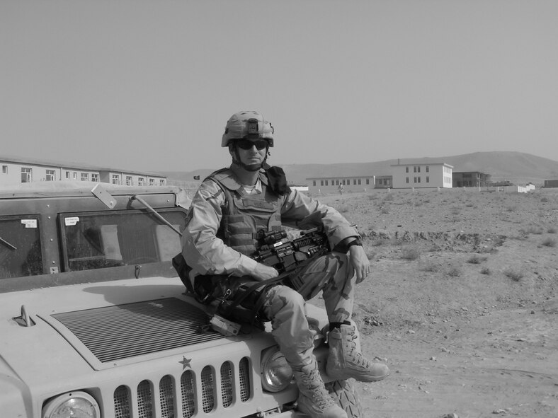 Tech. Sgt. Mark Wenell rests on his HMMWV in Zabul Province, Afghanistan
U.S. Air Force Photo