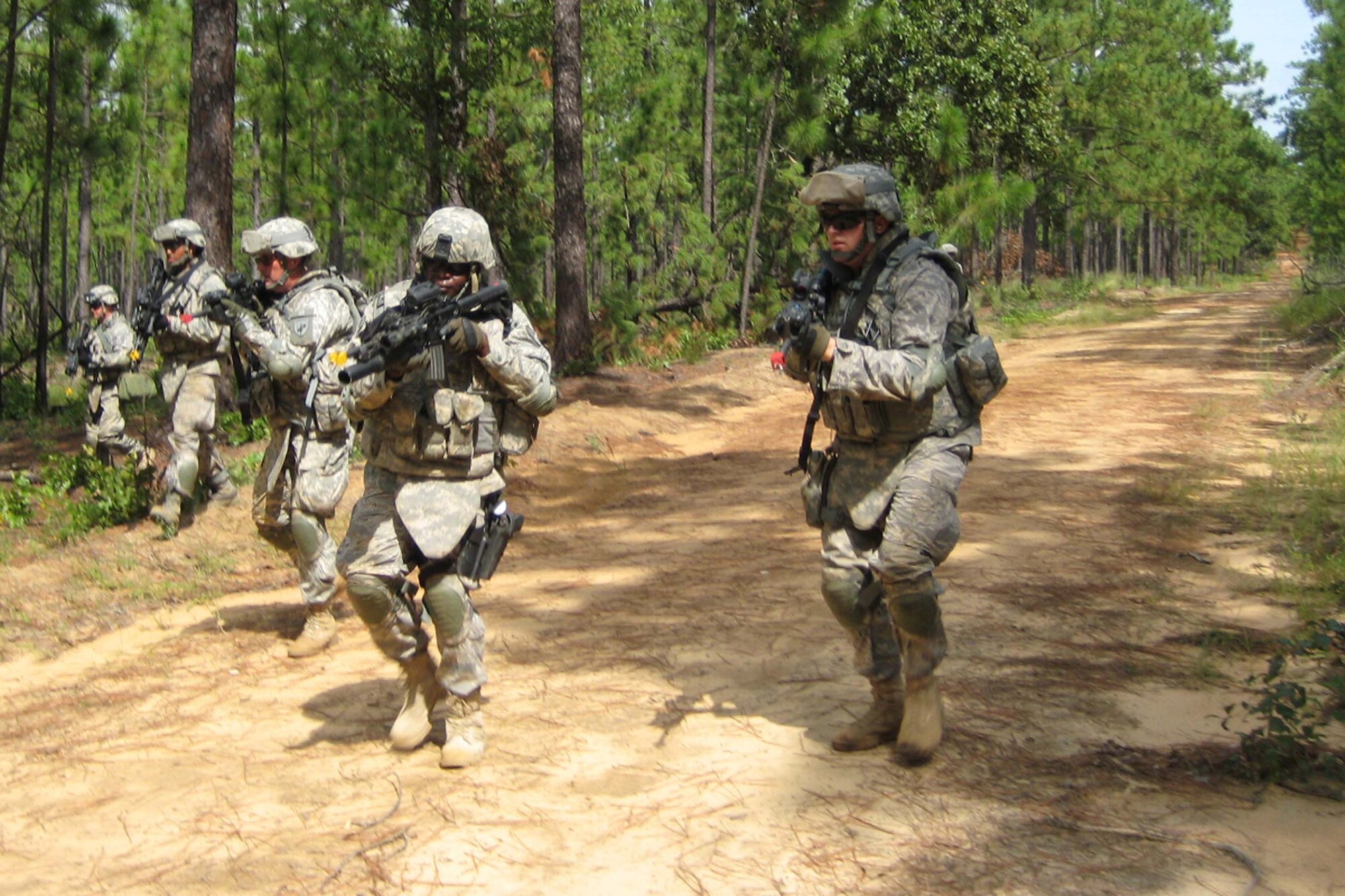FORT BRAGG, N.C. -- Airmen and Soldiers conduct simulated combat operations during a training exercise Sept. 14. The servicemembers are all training in preparation to deploy as a Provincial Reconstruction Team to the Nangarhar Province in Afghanistan. More than 175 Airmen have trained with their joint teams for the past 2 months and are scheduled to deploy next month. (Courtesy 
photo)
