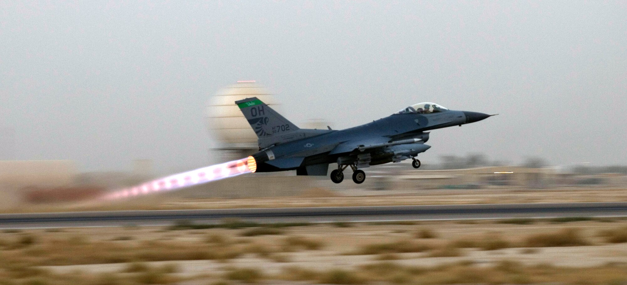 An F-16 Fighting Falcon with the 332nd Expeditionary Fighter Squadron takes off from Joint Base Balad, Iraq, on a mission to support Operation Iraqi Freedom Sept. 29. The F-16 is deployed from the Air National Guard's 180th Fighter Wing in Toledo, Ohio. (U.S. Air Force photo/Tech. Sgt. Erik Gudmundson)