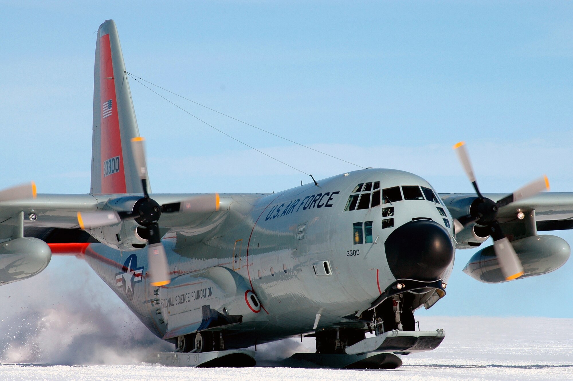 An LC130 Hercules from the 109th Airlift Wing NYANG takes off on the Greenland ice cap