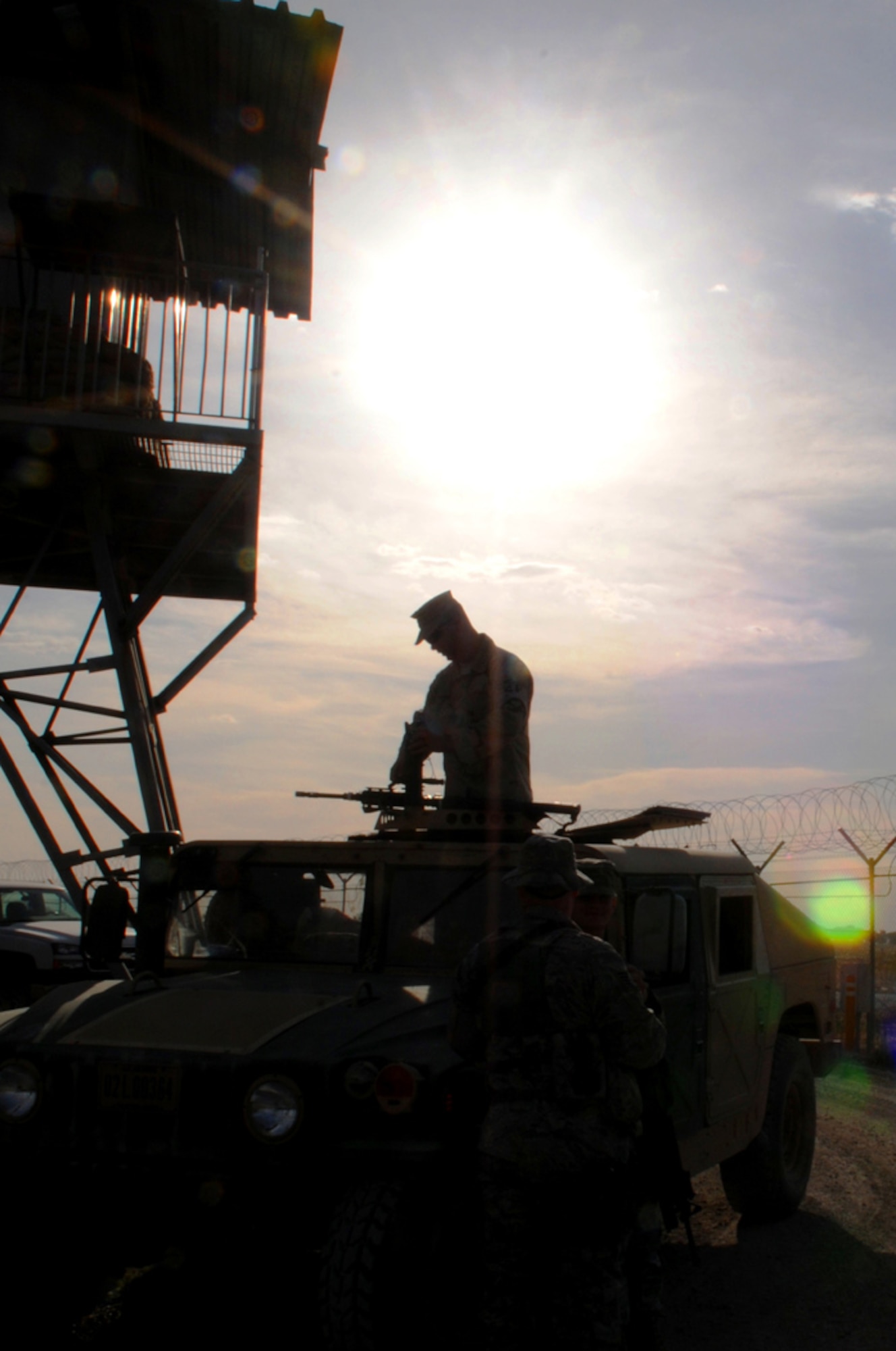 MANAS AIR BASE, KYRGYZ REPUBLIC -Staff Sgt. Daniel Meadors, a member of the 376th Expeditionary Security Forces Squadron quick response force, patrols the base here, Sept. 27. The 376th ESFS protects the base from any threats it may face from both inside and outside the perimeter. (Air Force photo / Senior Airman Ruth Holcomb)