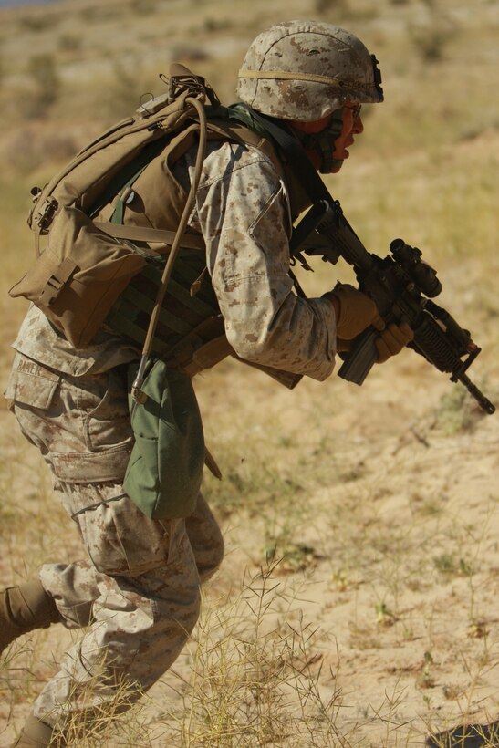 Lance Cpl. Sterling Baker, a light armored vehicle crewman with Company E, 3rd Light Armored Reconnaissance Battalion, begins his portion of the buddy rush. The newest company in 3rd LAR conducted cross training to teach their Marines all the different aspects of their job.