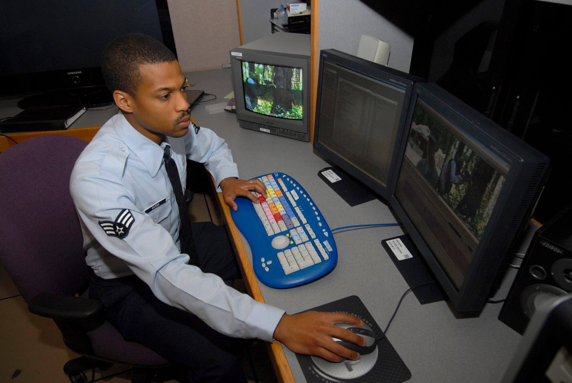 Senior Airman Joseph Givens edits video in a computer-based edit suite at Air University TV. Airman Givens was named the Defense Department's Military Videographer of the Year on March 29. (Air Force photo by Jamie Pitcher)