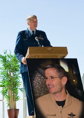 Maj. Gen. David Eichhorn, Air Force Flight Test Center commander, talks about retired Lt. Col. David Cooley during a memorial service at Hangar 1600 April 1. Colonel Cooley, Lockheed Martin F-22A Raptor test pilot, died in an F-22A crash March 25 during a test mission, northeast of Edwards. General Eichhorn also talked about the effort it took for the base and the entire Mojave Valley to recover Colonel Cooley's remains. (U.S. Air Force photo/Mike Yncera)