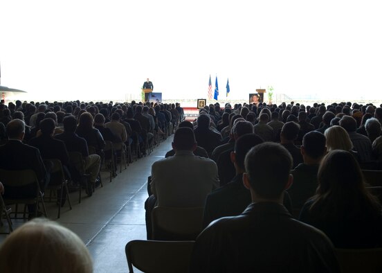 Team Edwards gathers at Hangar 1600 April for a memorial service dedicated to retired Lt. Col. David Cooley. Colonel Cooley, Lockheed Martin F-22A Raptor test pilot, died in an F-22A crash March 25 during a test mission, northeast of Edwards. (U.S. Air Force photo/Mike Yncera)