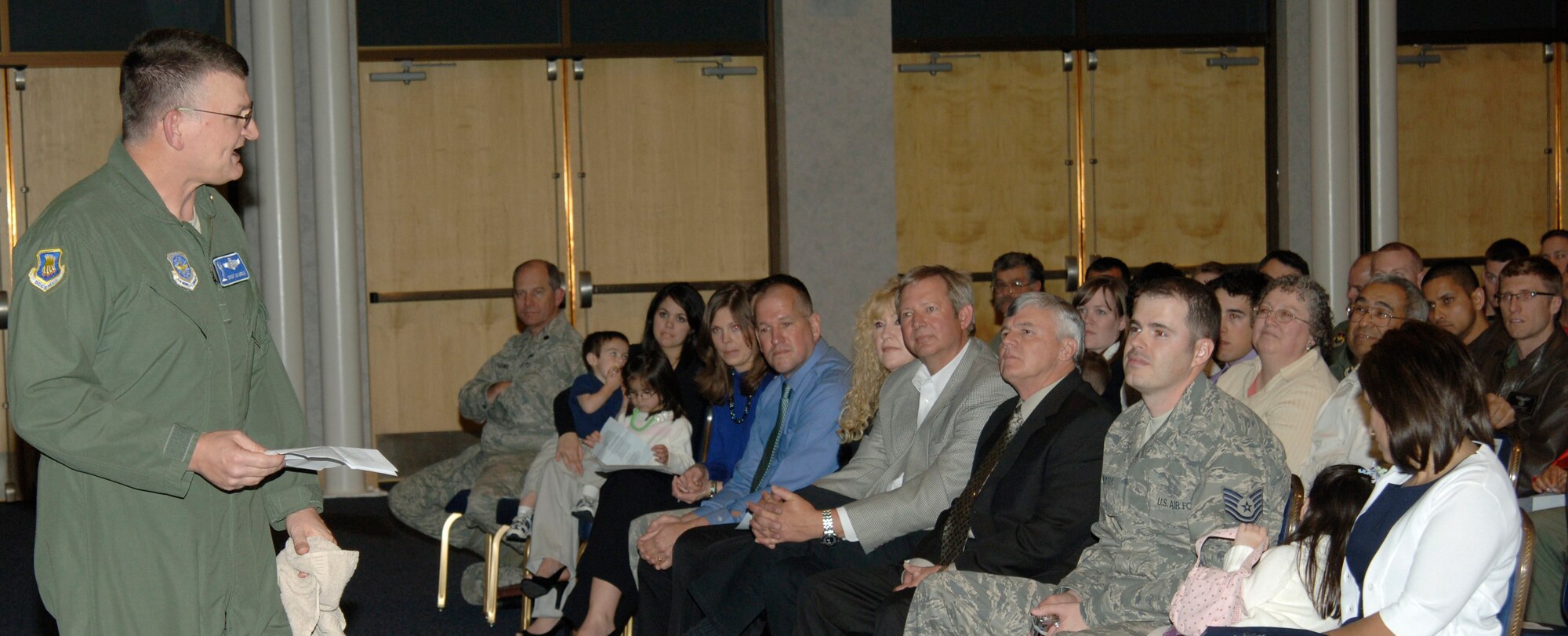MCCONNELL AIR FORCE BASE, Kan. -- Chief Master Sgt. James Morman, 22nd Air Refueling Wing former interim command chief  speaks about lessons he has learned to Team McConnell members as he gives his farewell speech during his retirement ceremony at the Robert J. Dole Community Center, March 27. Chief Morman spent 30 years in the Air Force. (Photo by Senior Airman Laura Suttles)