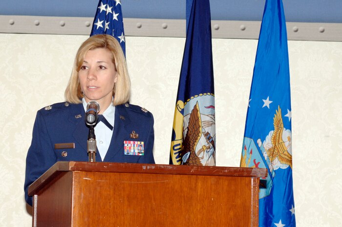 Lt. Col. Susan Ferrera recites a prayer for the nation during the National Prayer breakfast at the Charleston Club March 23. Originally called the Presidential Prayer Breakfast, the name was changed to the National Prayer Breakfast in 1970. Those who attend the breakfast discussed individual and daily spiritual needs as well as the dependence of our country on God. Colonel Ferrera is the 437th Mission Support Group deputy commander. (U.S. Air Force photo/Staff Sgt. Marie Cassetty)