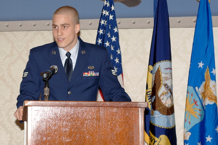 Senior Airman Matthew Adelman reads scripture during the National Prayer breakfast at the Charleston Club March 23. Originally called the Presidential Prayer Breakfast, the name was changed to the National Prayer Breakfast in 1970. Those who attend the breakfast discussed individual and daily spiritual needs as well as the dependence of our country on God. Airman Adelman is assigned to the 437th Maintenance Squadron. (U.S. Air Force photo/Staff Sgt. Marie Cassetty)
