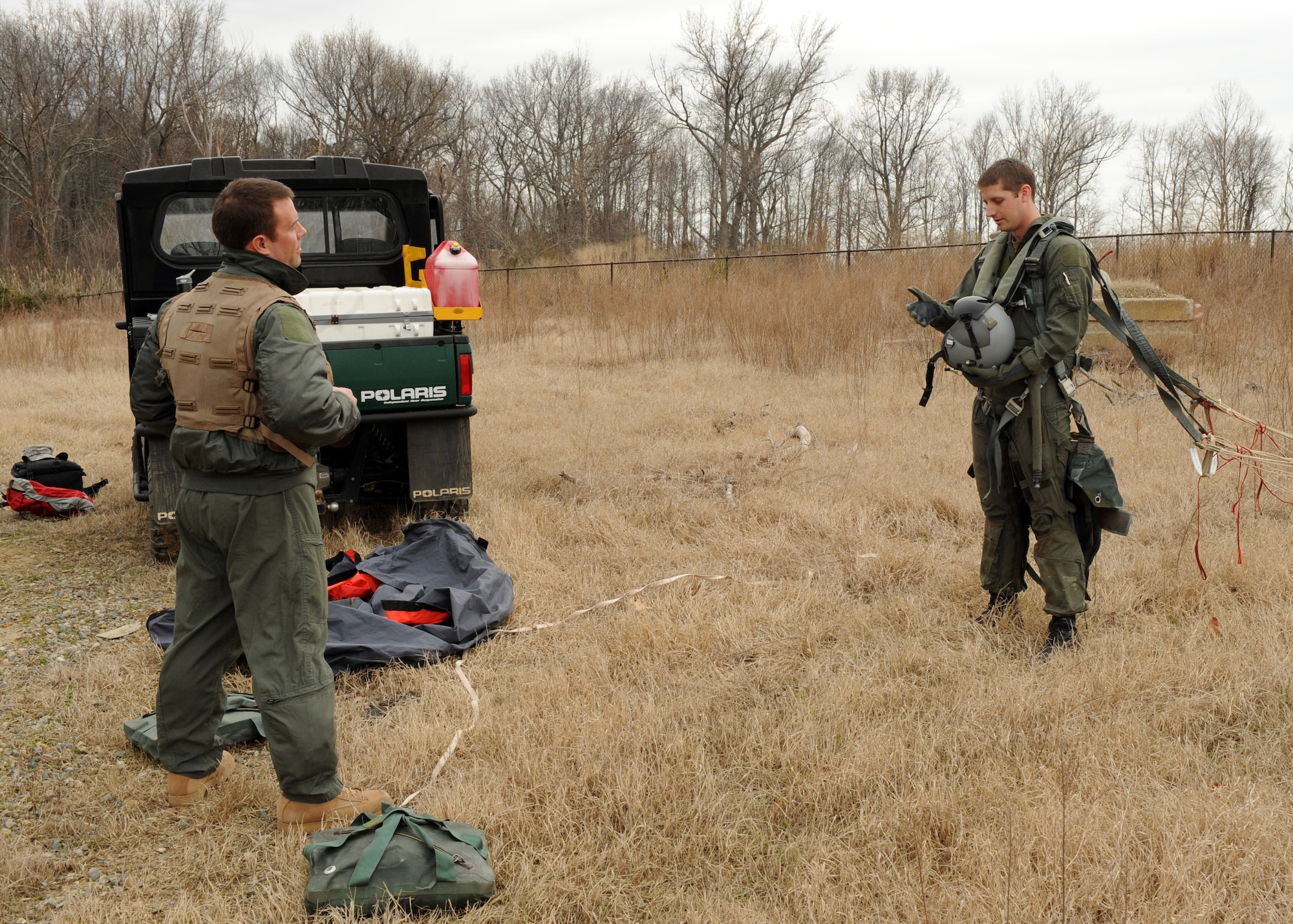 LANGLEY AIR FORCE BASE Va. -- Captain Kevin Wenger, 71st Fighter Squadron pilot, receives immediate evasion action training from Staff Sgt. Cody Lefever, 1st Fighter Wing Survival, Evasion, Rescue and Escape cadre here 25 Mar. SERE training is part of a refresher course in order to test the skills of downed pilots in enemy territory.  (U.S. Air Force photo/Airman 1st Class Jonathan Koob)