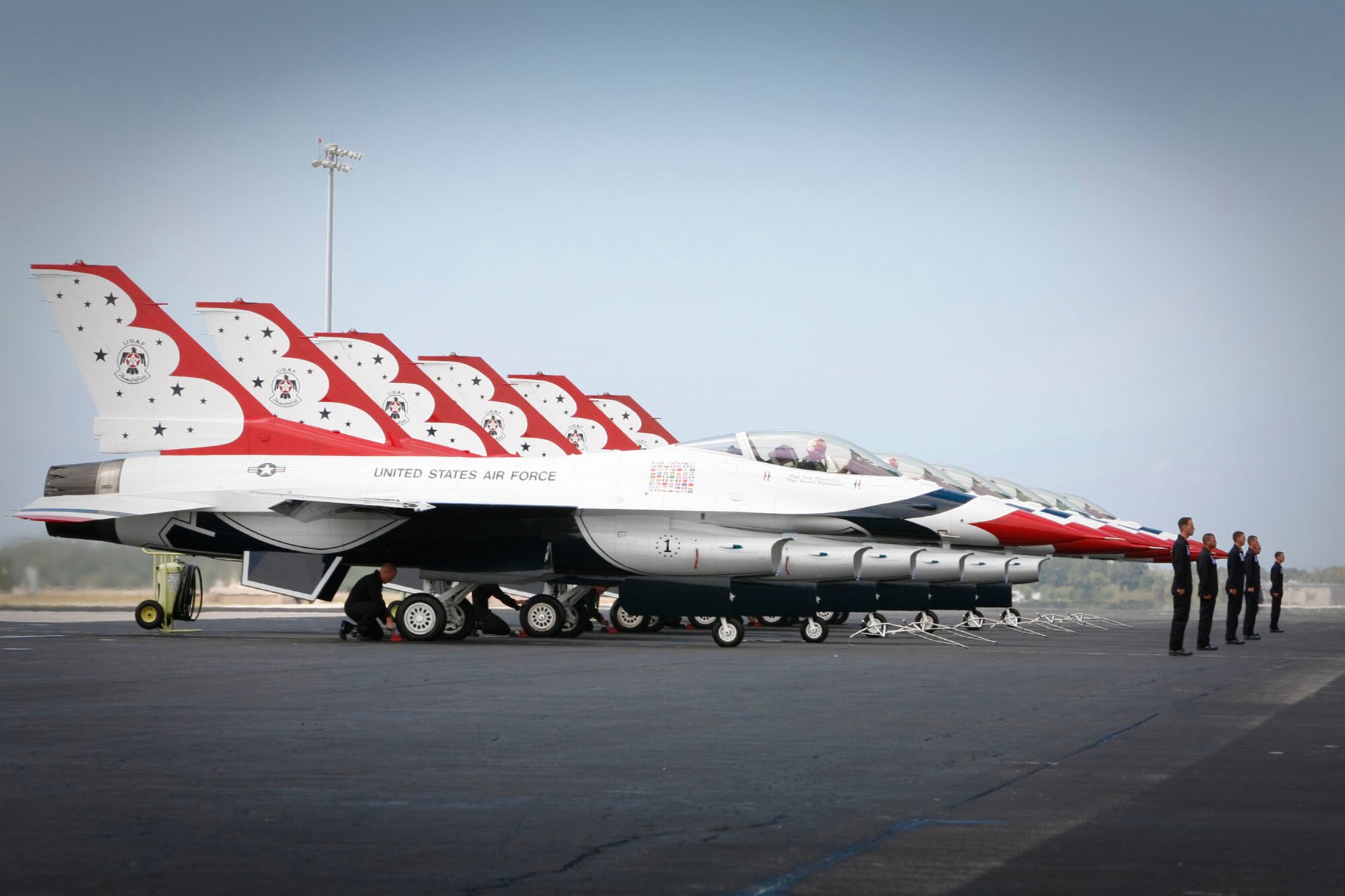 Members from the U.S. Air Force Thunderbirds  prepare for their aerial demonstration at MacDill?s Air Fest 2009. (U.S. Air Force photo/Master Sgt. Mark Borosch)