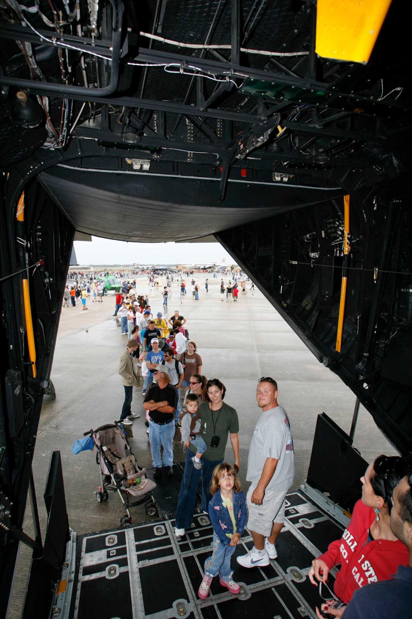 Spectators wait in line to view a C-130 Hercules, one of many static displays at MacDill?s AirFest 2009 (U.S. Air Force photo/Master Sgt. Mark Borosch)