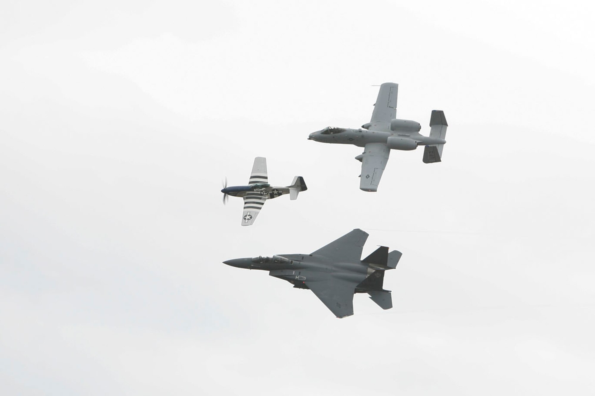 F-15E Strike Eagle, A-10 Thunderbolt and a P-51 perform a heritage fly-by at MacDill?s Air Fest 2009 (U.S. Air Force photo/Master Sgt. Mark Borosch)