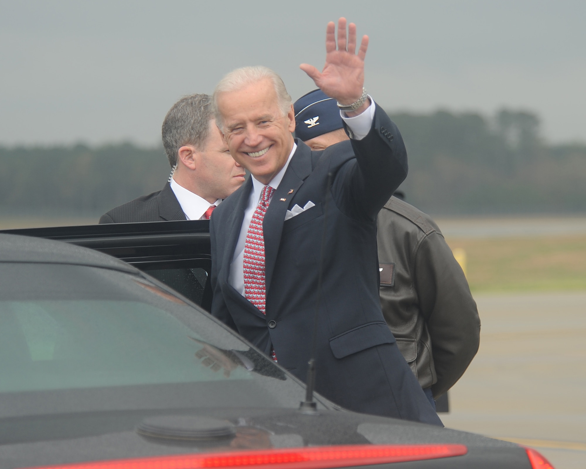 Vice President Joe Biden waves to the crowd after arriving at Seymour Johnson Air Force Base, N.C., April 1, 2009. The Vice President visited communities near the base to announce stimulus funding for local projects. (U.S. Air Force photo by Staff Sgt. Jessica Varrato)
