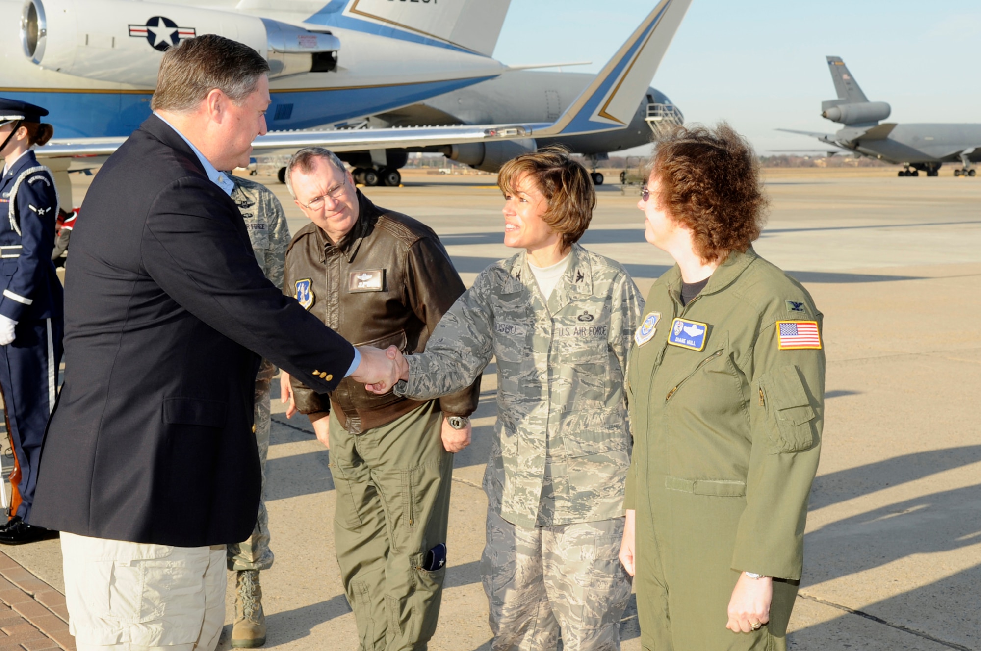 Col. Gina Grosso, 87th Air Base Wing commander, welcomes Secretary of the Air Force Michael B. Donley as he arrives here March 31. During his visit, the SECAF toured the U.S. Air Force Expeditionary Center at Fort Dix and held a SECAF call for all Airmen. (U.S. Air Force photo/Carlos Cintron)