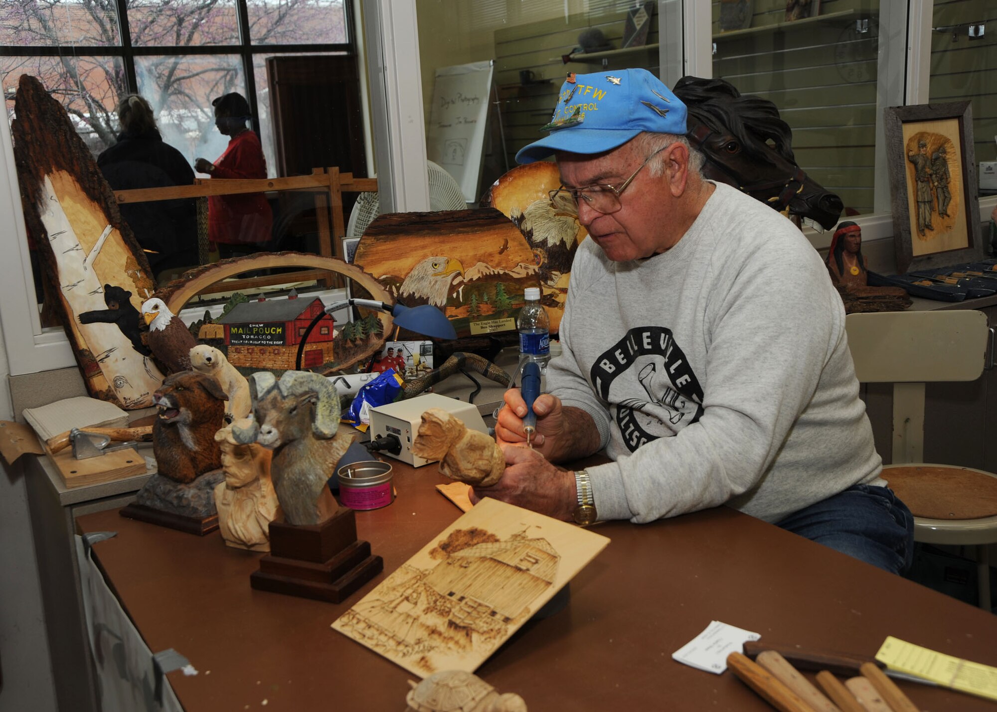 SCOTT AIR FORCE BASE, Ill. --Bellevile resident Ben Schupert demonstrates his woodcarving craft. Ben is a member of the Belleville Area Holzchnitzers (Woodcarvers). (U.S. Air Force photo/Tech. Sgt. Michelle Larche) 