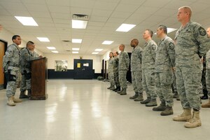 LANGLEY AIR FORCE BASE, Va. -- Langley chiefs receive training during the 1st Security Forces Squadron guardmount as they prepare to perform installation entry controller duties here April 1. This duty ensures every vehicle operator entering the base has a valid identification card. Langley's enlisted senior leadership volunteer for this duty at least once a quarter.  (U.S. Air Force photo/Senior Airman Vernon Young)