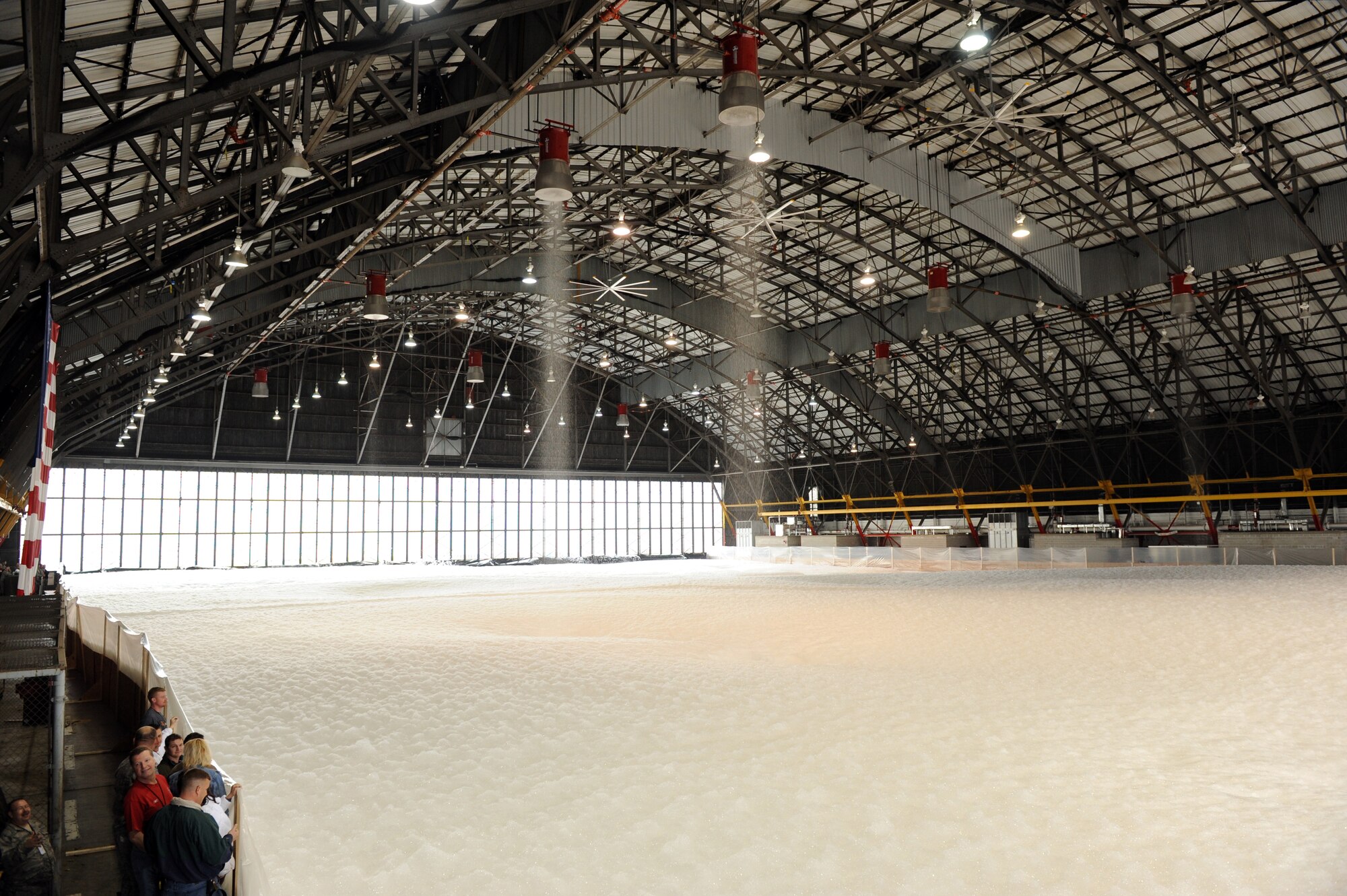 SCOTT AIR FORCE BASE. Ill. -- Fire suppresive foam covers the floor of Hangar 1 prior to a test of the new fire suppresion system March 24. The system covered the floor four feet deep in less than four minutes.  (U.S. Air Force photo/Staff Sgt. Paul Villanueva II)