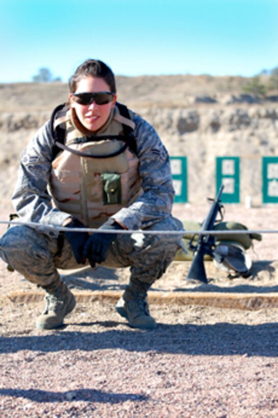 SOUTHWEST ASIA -- Airman 1st Class Amy Aquilera is currently deployed from Langley with the USAF Heritage of America Band ensemble, Oasis. She said the moment she realized she "wasn't in Kansas anymore" was when they plummeted to the ground headed for Iraqi soil, the load master on the C-130 started shouting at them to put their helmets and body armor on, NOW.  (Courtesy photo)