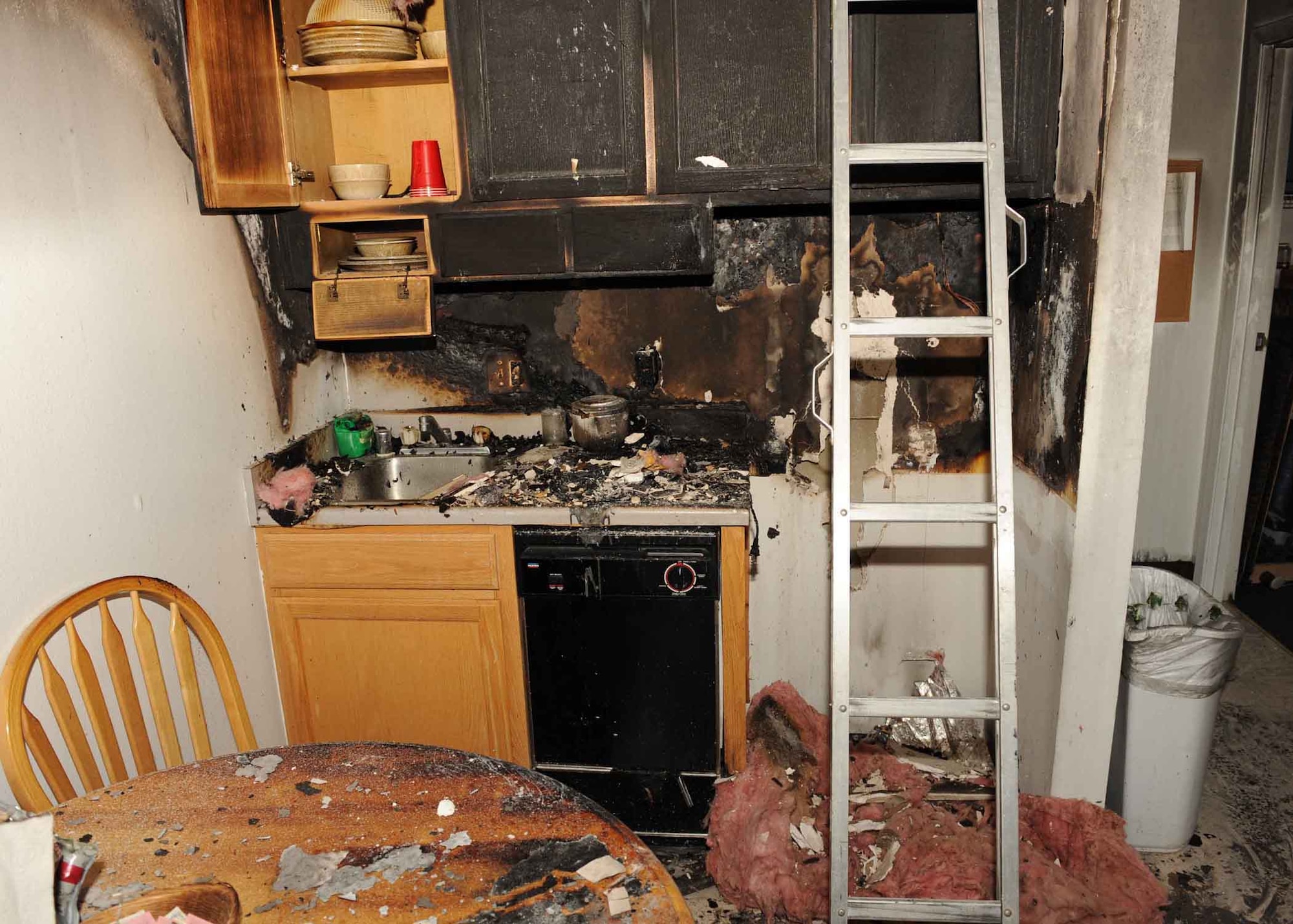 DYESS AIR FORCE BASE, Texas - A fire broke out at base lodging March 22. The fire was caused by burners being lit on a stove, while a toaster was left on top of the stove. The toaster caught fire burnt a section of the kitchen. The fire could have been prevented by having the toaster stored in an appropriate place and not on the stove. (U.S. Air Force photo by Senior Airman Domonique Simmons)