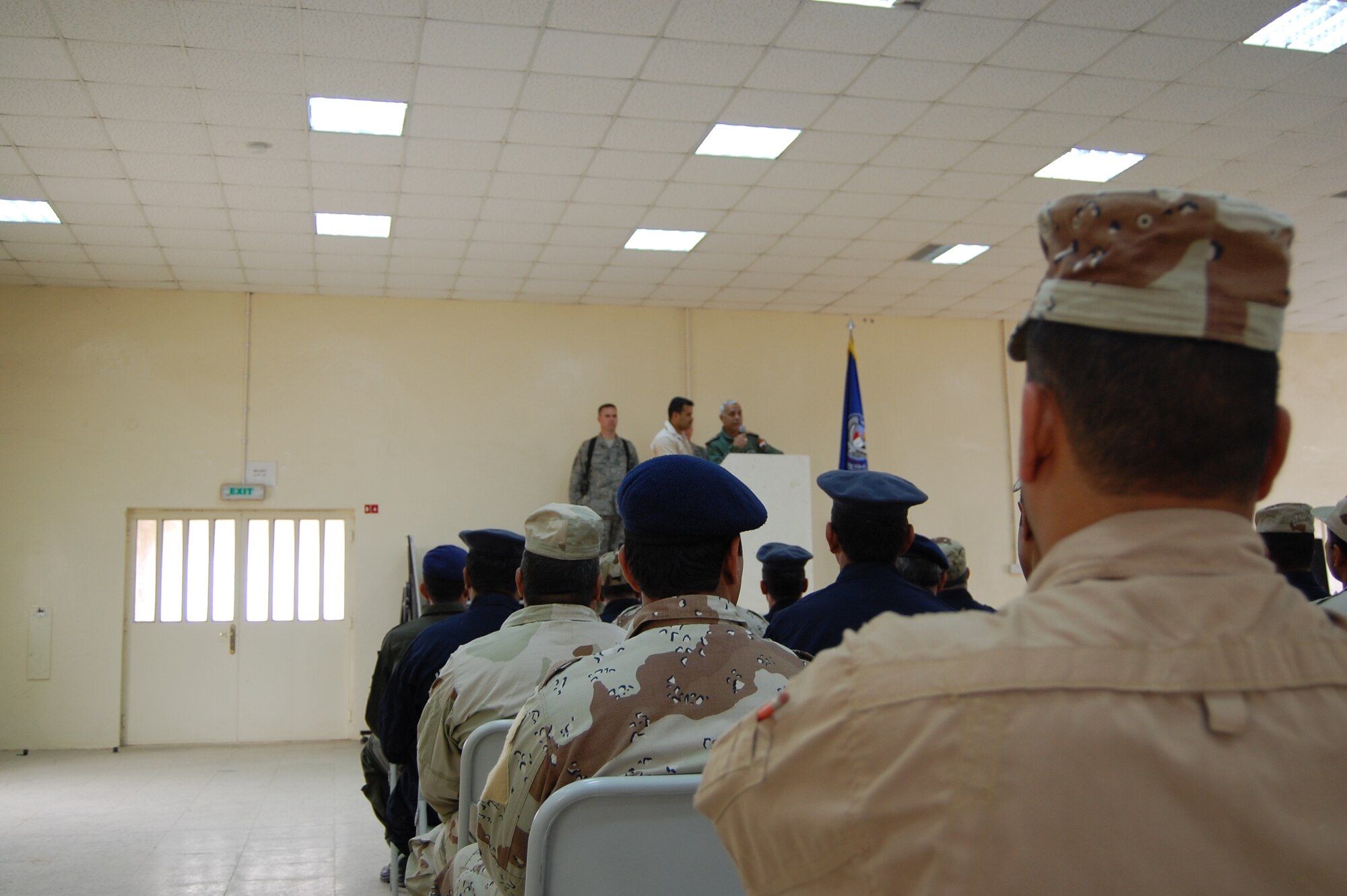 Iraqi General Nadam, Al Taji Air Base commander, speaks to the graduating class of the Iraqi warrant officer professional development course March 28 about the importance of taking the knowledge they gained back to the field. Twenty-nine Iraqi warrant officers completed the seven-day course where they were taught lessons on discipline, leader influence, teamwork and development, ethics and values, Law of Armed Conflict and problem solving. (U.S. Air Force photo by Staff Sgt. Tim Beckham)