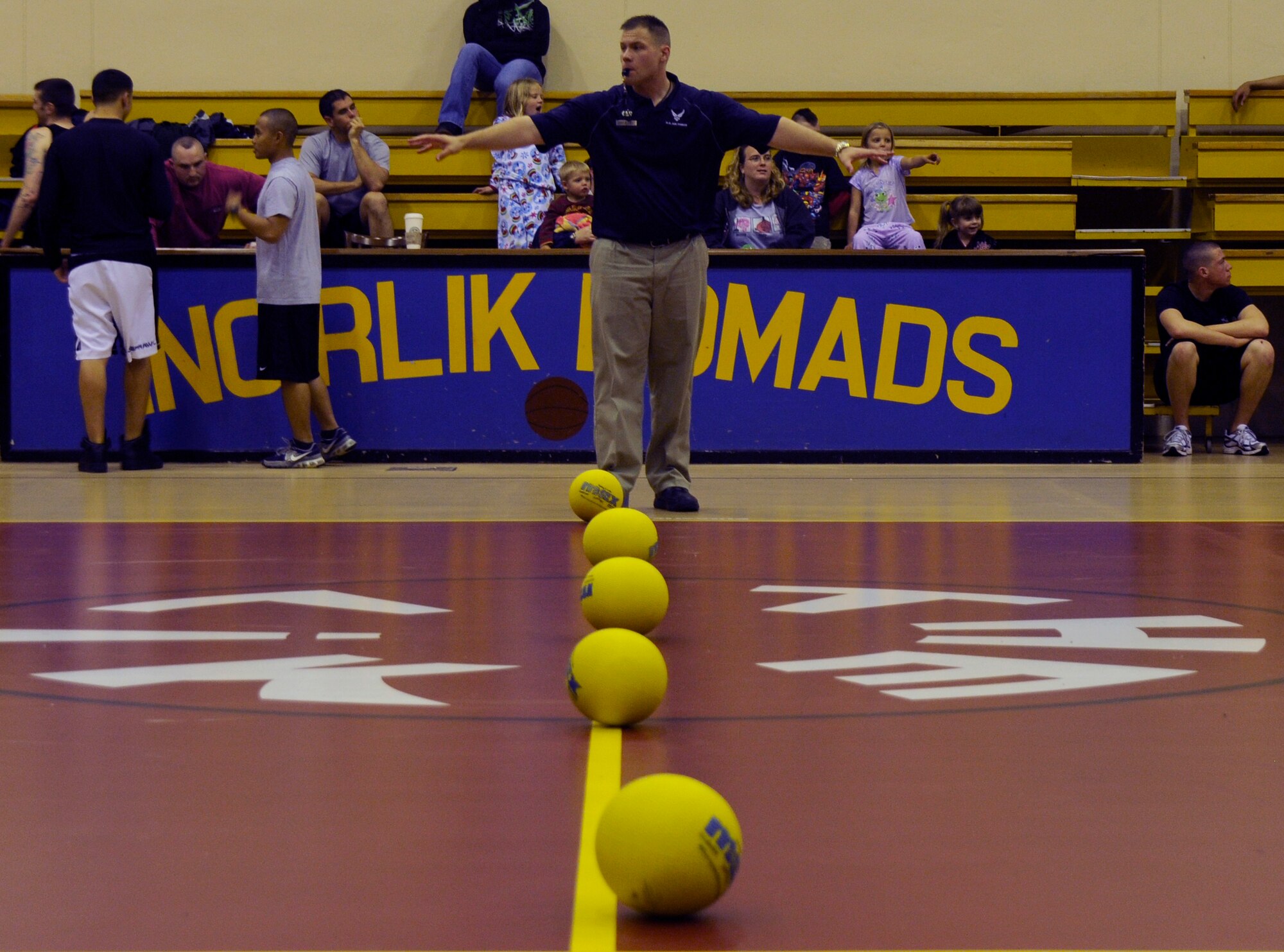 Justin Thibault, referee, sets the teams ready to begin the next game of “late-night dodgeball” at the Incirlik Fitness Center Friday, March 27, 2009.  The “late-night” games are played to boost morale for the Airmen located at this overseas base. (U.S. Air Force photo/Airman 1st Class Amber Russell, 39th Air Base Wing Public Affairs)