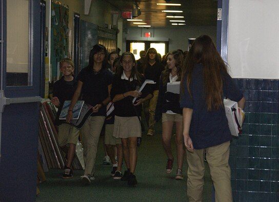 ANDERSEN AIR FORCE BASE, Guam -- Students of Andersen Middle School sport the correct wear of school uniforms during a class change April 2 here. School uniforms were implemented at Department of Defense Education Activity schools on Guam in the 2007-2008 school year. Parents can ook forward to minute changes and refinements to the uniform policy as it will be reviewed during the upcoming 2009-2010 school year. (U.S. Air Force photo by Airman Carissa Wolff)                               