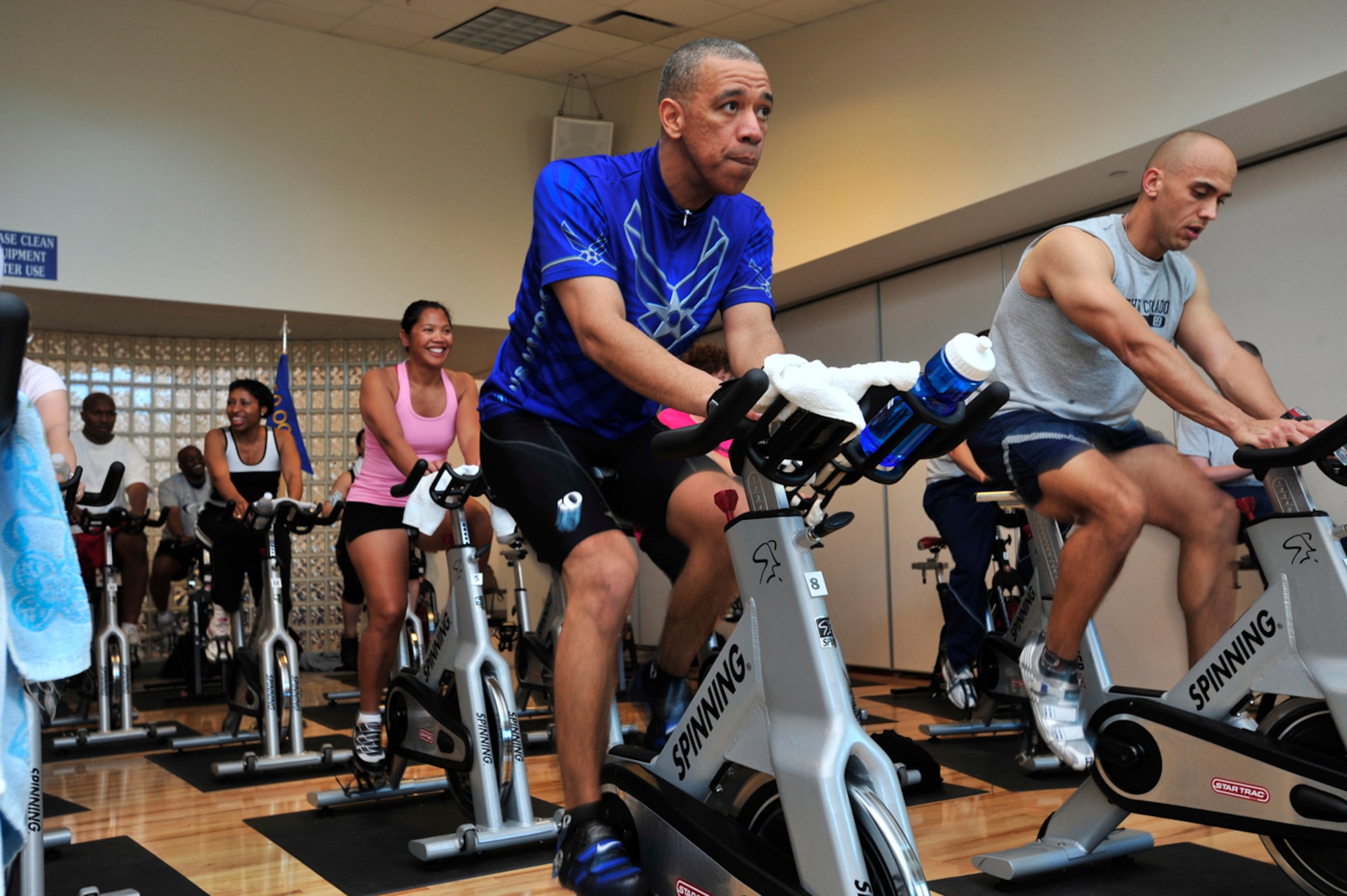 BUCKLEY AIR FORCE BASE, Colo. -- Col. Vincent Jefferson, Misson Support Group Commander, cycles for 12 hours during Buckley's inaugural Spinathon March 19. Col. Jefferson frequents the spin classes daily where he and his spouse, Sandra Jefferson, are also instructors. (U.S. Air Force photo by Senior Airman Alex Gochnour)