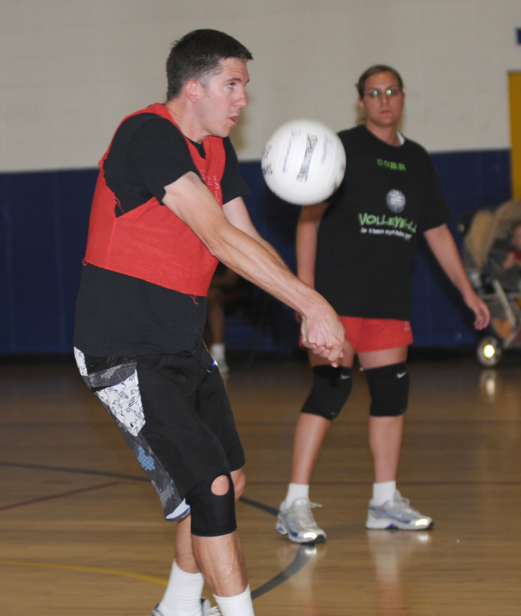 Jason Cunningham returns a shot for the 338th TRS during a March 25 game against the 81st FSS.  (U.S. Air Force photo by Kemberly Groue)
