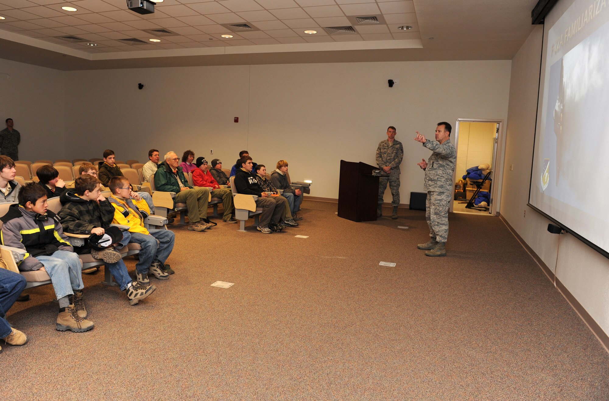 Col. George Torres, 49th Maintenance Group commander, briefs Boy Scout Troop 174, based out of Albuquerque, N.M., during an F-22A Raptor Familiarization Course March 27 at Holloman Air Force Base, N.M. The course is designed to provide people a better understanding of the aircraft. 