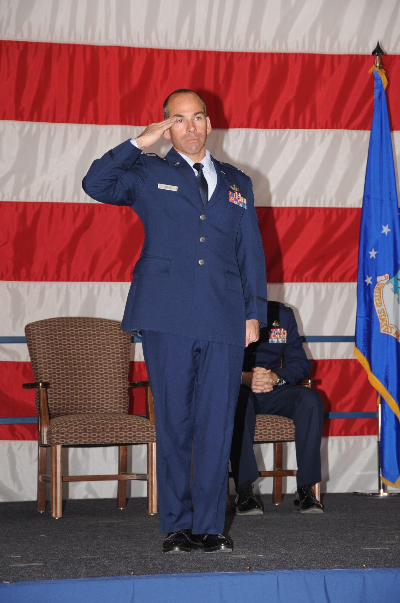 Lt. Col. Steven Biggs, 37th Bomb Squadron commander, salutes the 37 BS for the first time as the new 37 BS commander here, April 2.  Col. Buck Shawhan, 28th Operations Group commander, officiated the change of command ceremony. (U.S. Air Force photo/Senior Airman Anthony Sanchelli)
