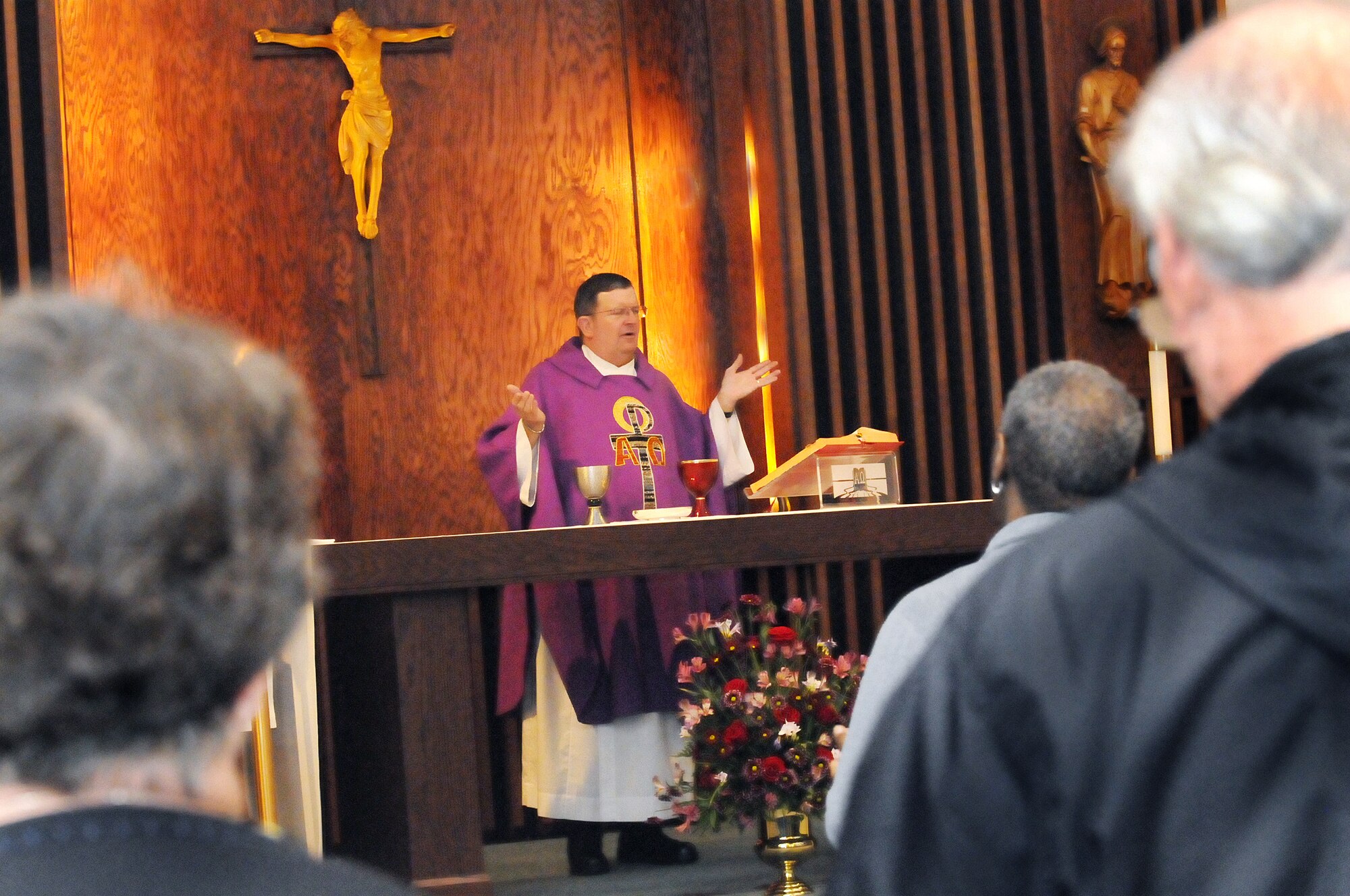 Chaplain (Lt. Col.) Thomas Fey, Robins Chapel Catholic chaplain leads mass April 1. U. S. Air Force photo by Sue Sapp