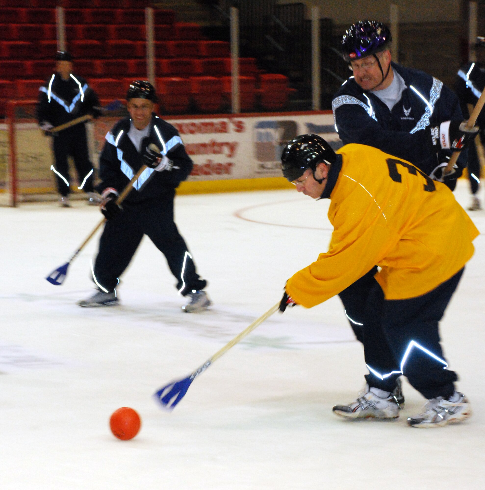 Brig. Gen. O.G. Mannon, 82nd Training Wing commander, held his monthly wing leadership physical training session at the Kay Yeager Coliseum April 2.  Bryan “Moose” Panik, ice program coordinator, worked with Sheppard representatives to make the Wichita Falls Wildcat’s ice rink available for a couple of  rousing games of broomball.  Wing leadership borrowed the rink to continue their physical fitness training while having a little fun in the process. (U.S. Air Force photo/Airman 1st Class Valerie Hosea) 