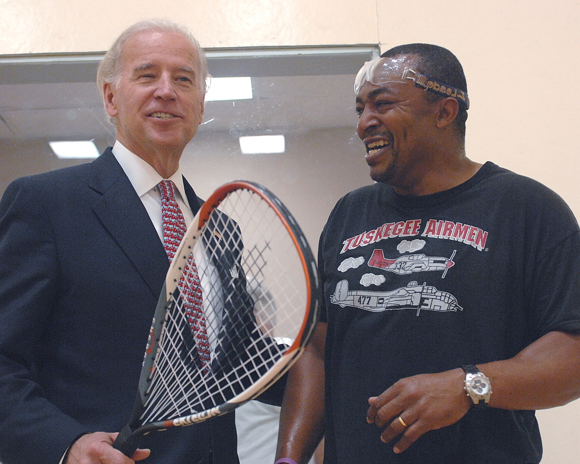 Vice President Joe Biden gets a laugh out of Johnnie Webster, 4th Communications Squadron, at the fitness center on Seymour Johnson Air Force Base, N.C., April 1, 2009. The Vice President told Mr. Webster how he missed playing racquetball and joked about how badly he was defeated in a match around the time of his first presidential bid in 1988. (U.S. Air Force photo by Staff Sgt. Shawn J. Jones) 