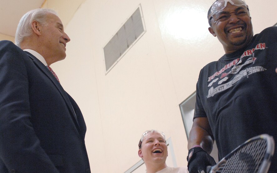Vice President Joe Biden gets a laugh out of Johnnie Webster (right) and Staff Sgt. William Rudoff, 4th Communications Squadron, on a racquetball court at Seymour Johnson Air Force Base, N.C., April 1, 2009. Behind the closed doors of the racquetball court, the Vice President told several humorous, sports-related stories which kept Mr. Webster and Sergeant Rudoff laughing throughout. Sergeant Rudoff said he was surprised when his match was interrupted by the Vice President and that he was impressed by Mr. Biden's down-to-earth, candid demeanor. (U.S. Air Force photo by Staff Sgt. Shawn J. Jones)