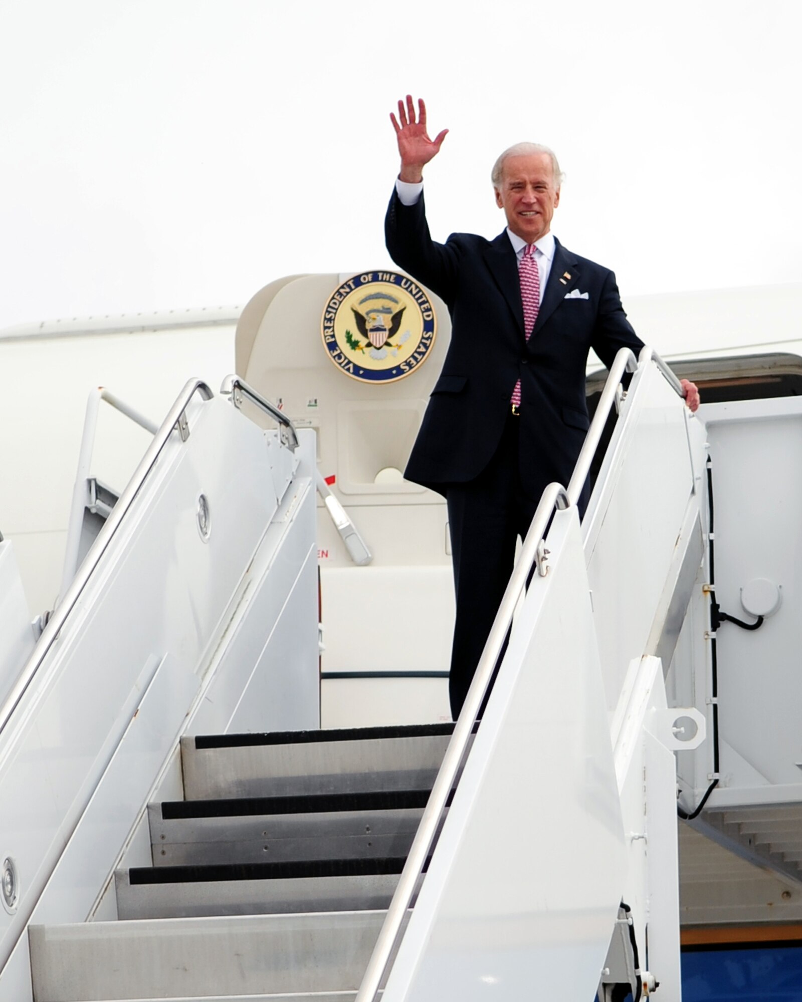 Vice President Joe Biden waves goodbye prior to boarding Air Force Two at Seymour Johnson Air Force Base, N.C., April 1, 2009. The Vice President visited rural areas near the base to explain how the new economic stimulus plan will impact local projects. (U.S. Air Force Photo by Airman 1st Class Rae Perry) 