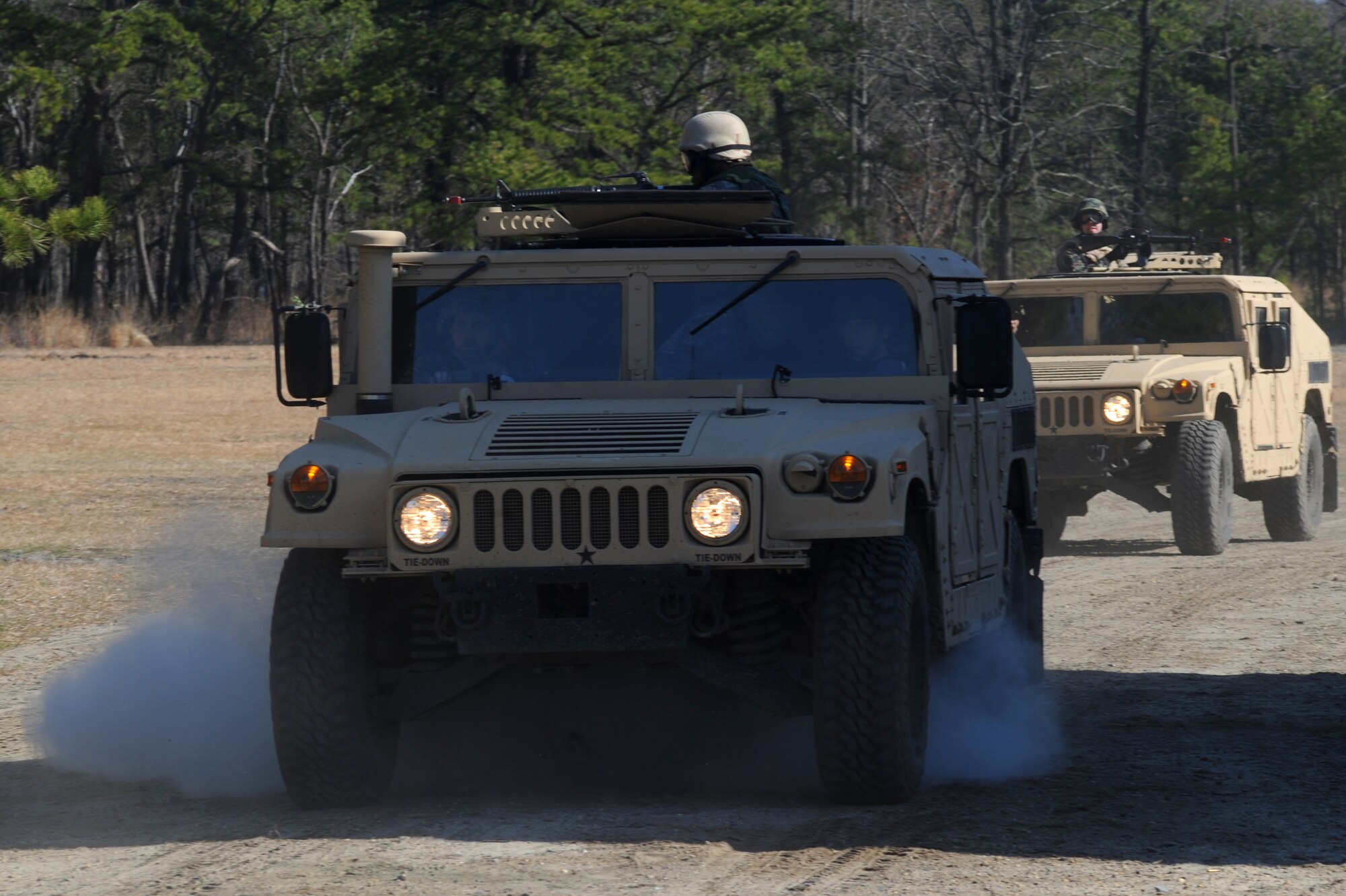 A HUMVEE drives over a controlled improvised explosive during convoy operations training on a Fort Dix, N.J. range, March 31, 2009.  The students are in a U.S. Air Force Expeditionary Center's Advanced Contingency Skills Training Course taught by the 421st Combat Training Squadron which prepares Airmen for upcoming deployments with advanced combat skills.   (U.S. Air Force Photo/Staff Sgt. Nathan G. Bevier) 