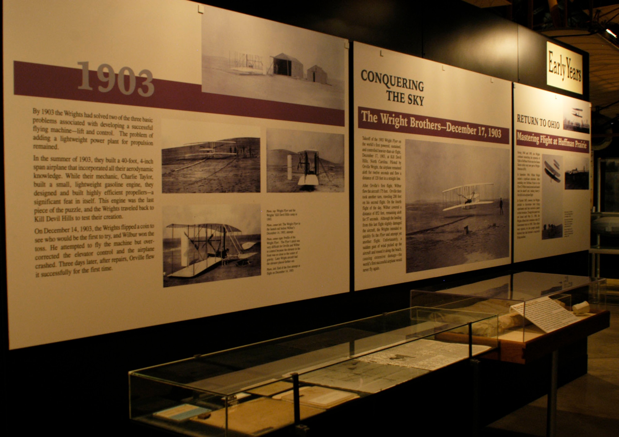 DAYTON, Ohio -- Wright brothers exhibit in the Early Years Gallery at the National Museum of the United States Air Force. On display is a statement signed by the Wright brothers' mechanic, Charlie Taylor, who built the engine for the 1903 aeroplane, as well as original fabric from the 1903 Flyer. (U.S. Air Force photo)
