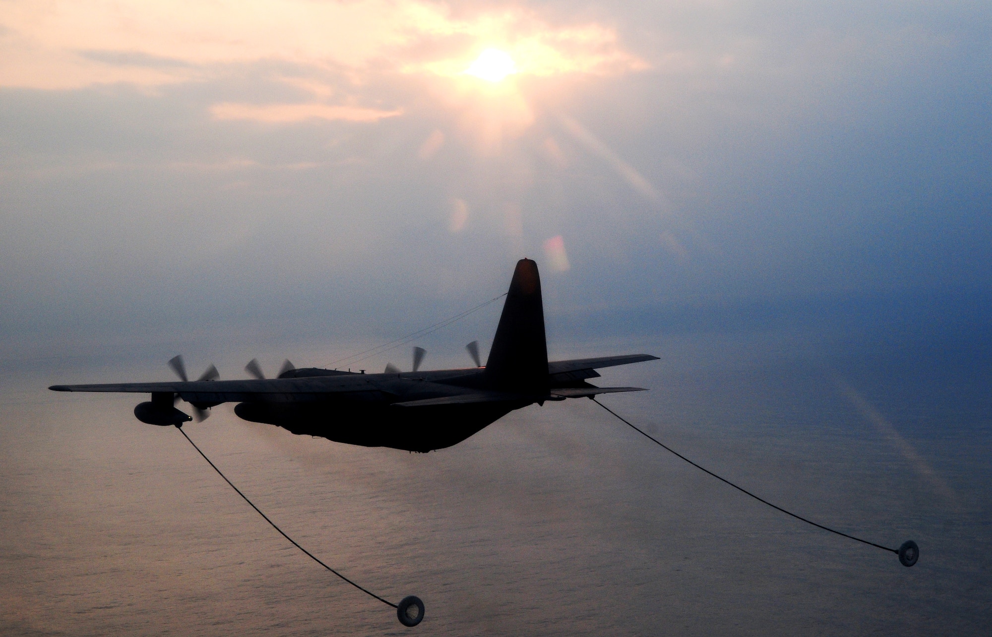 An HH60G-Pave Hawk from the 33rd Rescue Squadron refuels during a three-day intensive air refueling course March 24. Pilots from the 33rd RQS put together a refueling training program for Japanese Defense Force helicopter pilots to provide them the tools to begin conducting long-range rescue missions.  
(U.S. Air Force photo/Staff Sgt. Chrissy Best)     