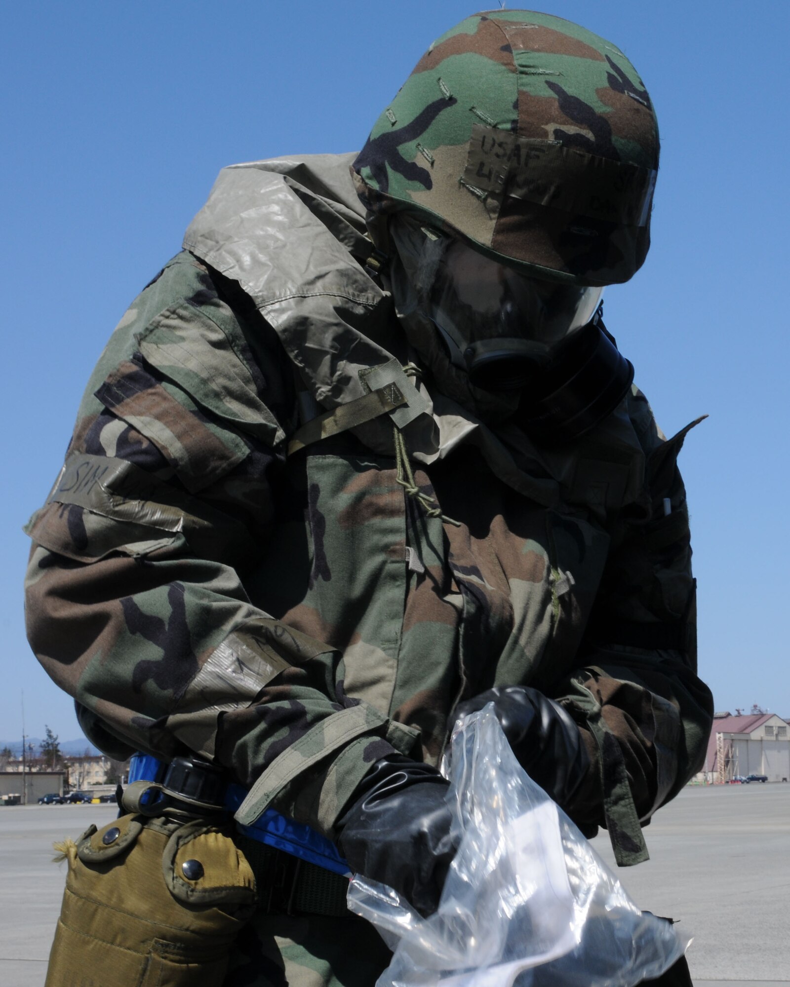 YOKOTA AIR BASE, Japan -- Senior Airman Linwood Joseph Dawley, 374th Aircraft Maintenance Squadron, pulls out a daily documentation form for a piece of aerospace ground equipment April 2 on the flightline during Phase II of Exercise Beverly Morning 09-03. (U.S. Air Force photo/Airman Sean Martin)