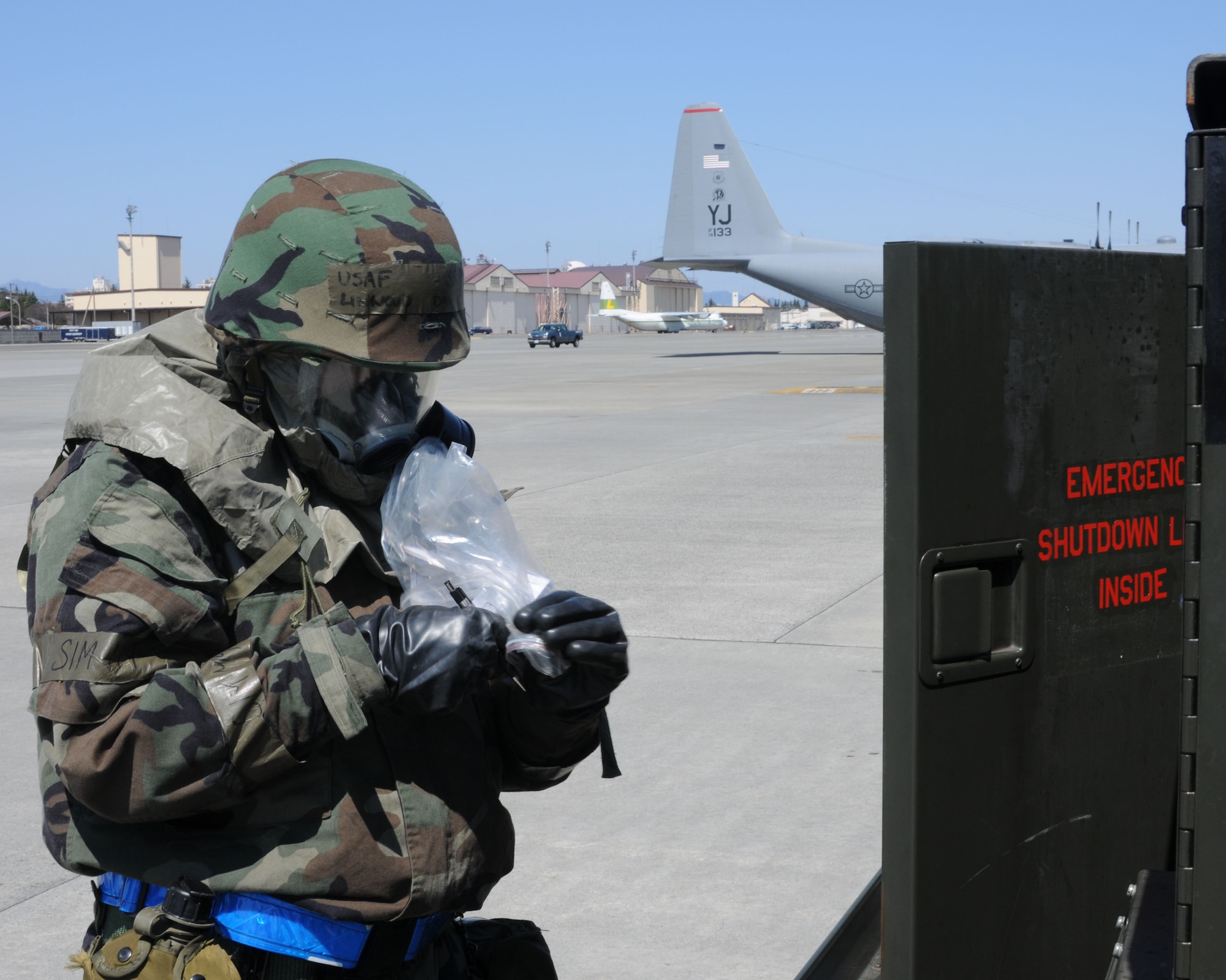 YOKOTA AIR BASE, Japan -- Senior Airman Linwood Joseph Dawley, 374th Aircraft Maintenance Squadron, fills out a daily documentation form for a piece of aerospace ground equipment April 2 on the flightline during Phase II of Exercise Beverly Morning 09-03. (U.S. Air Force photo/Airman Sean Martin)