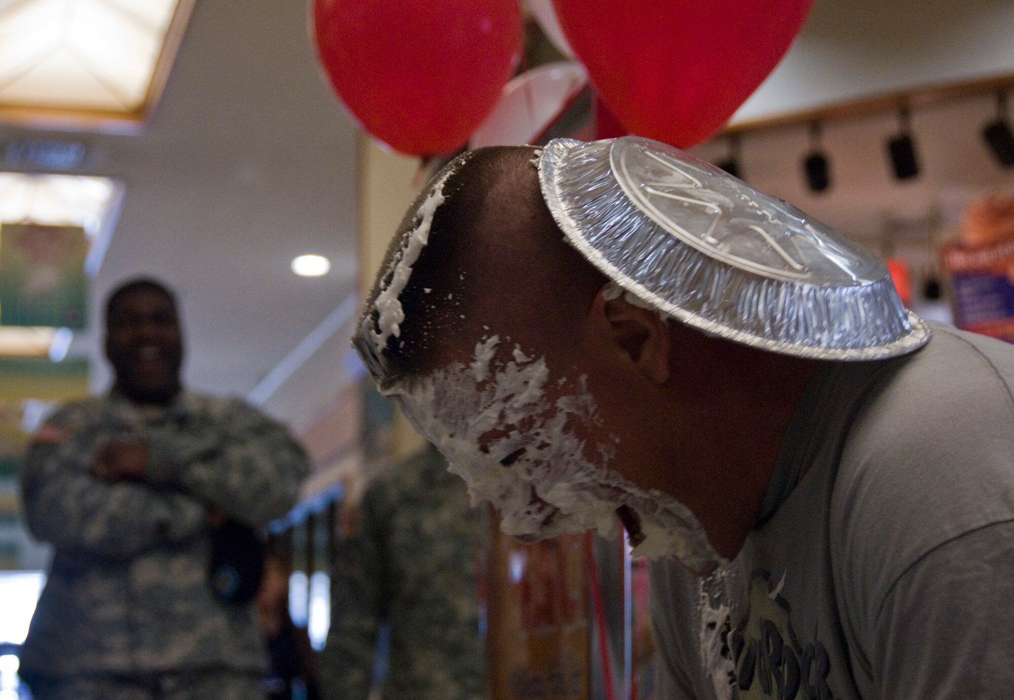 MISAWA AIR BASE, Japan -- Master Sgt. Gordon Evarts, 301st Intelligence Squadron first sergeant, takes a pie in the face April 1, 2009.  Sergeant Evarts received the least amount of votes for the pie in the face, earning him the first pie. (U.S. Air Force photo by Staff Sgt. Araceli Alarcon)